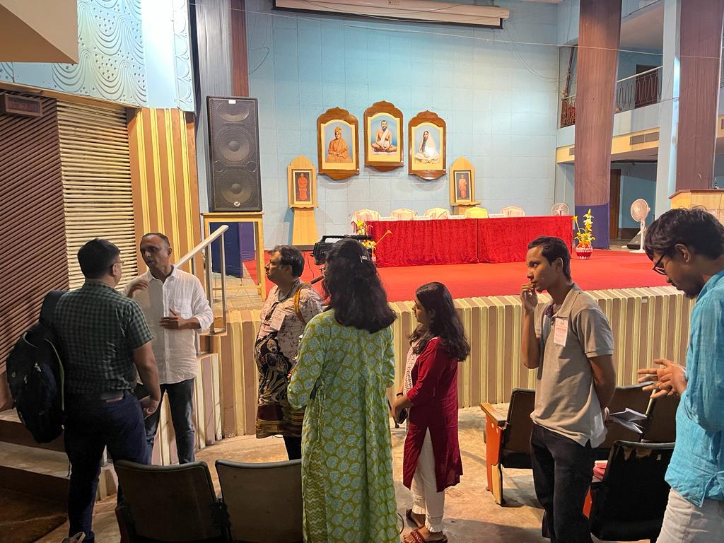 Aditya conversing with people